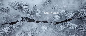 Movie still from “Broken” (2021), directed by Patrick Phillips – A view from above of trees and a river; Extreme Wide shot, Overhead angle