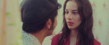 Movie still from “Burning Patience” (2022), directed by Rodrigo Sepúlveda – A man and a woman talking to each other; Close Up shot, Over the shoulder angle