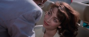 Movie still from “Cape Fear” (1991), directed by Martin Scorsese – A person wearing a suit and tie; Close Up shot, Over the shoulder angle