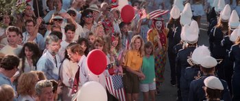 Movie still from “Cape Fear” (1991), directed by Martin Scorsese – A group of people standing next to each other on a street; Wide shot, High angle