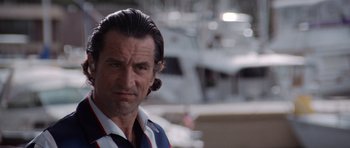 Movie still from “Cape Fear” (1991), directed by Martin Scorsese – A person wearing a shirt; Close Up shot, Low angle