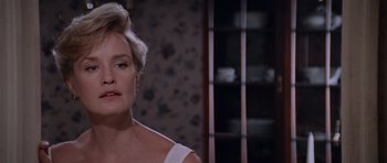 Movie still from “Cape Fear” (1991), directed by Martin Scorsese – A person with short blonde hair; Close Up shot, Over the shoulder angle