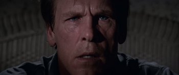 Movie still from “Cape Fear” (1991), directed by Martin Scorsese – A man's face in the dark; Close Up shot, Low angle