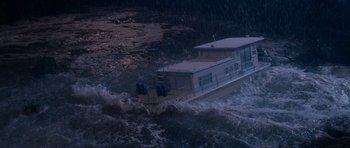 Movie still from “Cape Fear” (1991), directed by Martin Scorsese – A boat in the middle of the ocean in the rain; Extreme Wide shot, High angle