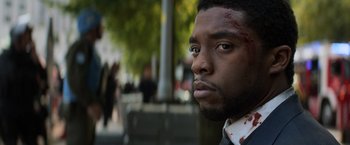 Movie still from “Captain America: Civil War” (2016), directed by Anthony Russo – A person with blood on his face; Close Up shot, Low angle