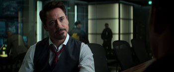 Movie still from “Captain America: Civil War” (2016), directed by Anthony Russo – A person sitting in a chair; Close Up shot, Over the shoulder angle