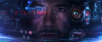 Movie still from “Captain America: Civil War” (2016), directed by Anthony Russo – A man's face with a computer screen in the background; Extreme Close Up shot, Over the shoulder angle