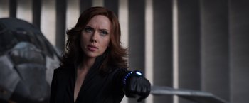 Movie still from “Captain America: Civil War” (2016), directed by Anthony Russo – A person wearing a glove; Close Up shot, Over the shoulder angle