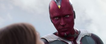 Movie still from “Captain America: Civil War” (2016), directed by Anthony Russo – A person wearing a costume; Close Up shot, Over the shoulder angle
