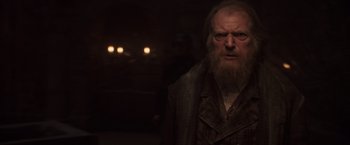 Movie still from “Captain America: The First Avenger” (2011), directed by Joe Johnston – An old man with a long white beard; Close Up shot, Over the shoulder angle