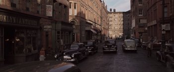 Movie still from “Captain America: The First Avenger” (2011), directed by Joe Johnston – A group of cars parked on the side of the street; Extreme Wide shot, High angle