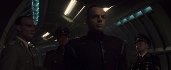 Movie still from “Captain America: The First Avenger” (2011), directed by Joe Johnston – A man in a military uniform and a man in a uniform; Medium shot, Over the shoulder angle