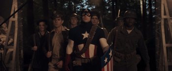 Movie still from “Captain America: The First Avenger” (2011), directed by Joe Johnston – A group of men dressed in military uniforms; Medium shot, Low angle