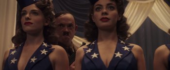 Movie still from “Captain America: The First Avenger” (2011), directed by Joe Johnston – A man and a woman dressed in military uniforms; Close Up shot, Low angle