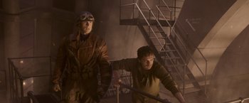 Movie still from “Captain America: The First Avenger” (2011), directed by Joe Johnston – Two men are standing next to each other; Medium shot, Low angle