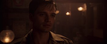 Movie still from “Captain America: The First Avenger” (2011), directed by Joe Johnston – A person wearing a jacket; Close Up shot, Over the shoulder angle