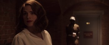 Movie still from “Captain America: The First Avenger” (2011), directed by Joe Johnston – A person wearing a white shirt; Close Up shot, Over the shoulder angle