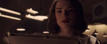 Movie still from “Captain America: The First Avenger” (2011), directed by Joe Johnston – A person looking at a mirror; Close Up shot, Over the shoulder angle