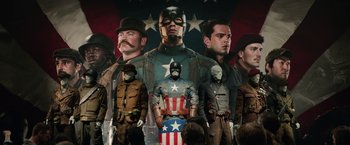 Movie still from “Captain America: The Winter Soldier” (2014), directed by Anthony Russo – A group of men standing next to each other; Medium shot, Low angle