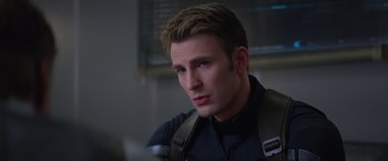 Movie still from “Captain America: The Winter Soldier” (2014), directed by Anthony Russo – A person wearing a uniform; Close Up shot, Over the shoulder angle