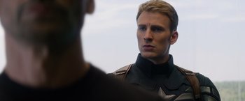 Movie still from “Captain America: The Winter Soldier” (2014), directed by Anthony Russo – A person wearing a uniform; Close Up shot, Over the shoulder angle