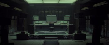 Movie still from “Captain America: The Winter Soldier” (2014), directed by Anthony Russo – A room that has a lot of computers on it; Wide shot, Low angle