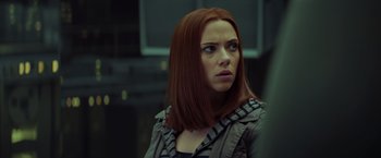 Movie still from “Captain America: The Winter Soldier” (2014), directed by Anthony Russo – A person with long red hair; Close Up shot, Over the shoulder angle