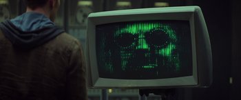 Movie still from “Captain America: The Winter Soldier” (2014), directed by Anthony Russo – A computer monitor with a picture of a face on it; Close Up shot, Over the shoulder angle