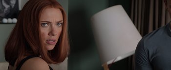 Movie still from “Captain America: The Winter Soldier” (2014), directed by Anthony Russo – A person with red hair looking at the camera; Close Up shot, Over the shoulder angle