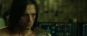 Movie still from “Captain America: The Winter Soldier” (2014), directed by Anthony Russo – A person with long dark hair; Close Up shot, Low angle