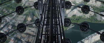 Movie still from “Captain America: The Winter Soldier” (2014), directed by Anthony Russo – Looking down at a tower of an industrial building; Extreme Wide shot, Overhead angle