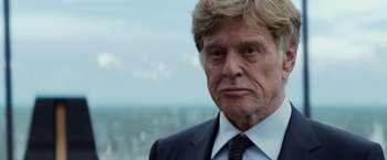 Movie still from “Captain America: The Winter Soldier” (2014), directed by Anthony Russo – An older man wearing a suit and tie; Close Up shot, Low angle