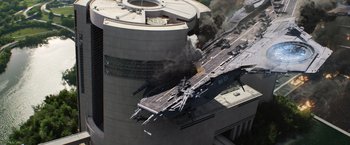 Movie still from “Captain America: The Winter Soldier” (2014), directed by Anthony Russo – An aircraft carrier is on fire in the middle of a building; Extreme Wide shot, Overhead angle