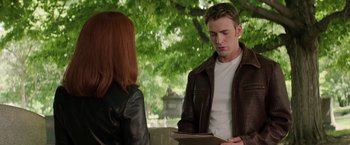Movie still from “Captain America: The Winter Soldier” (2014), directed by Anthony Russo – A man and a woman are looking at a piece of paper; Medium shot, Over the shoulder angle