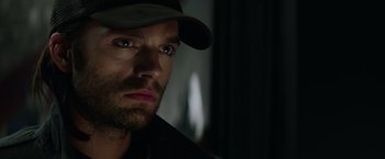 Movie still from “Captain America: The Winter Soldier” (2014), directed by Anthony Russo – A person wearing a hat; Close Up shot, Low angle
