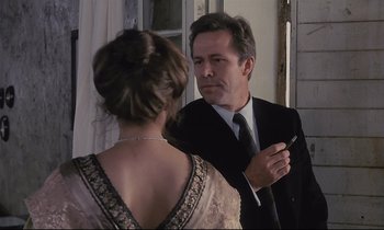 Movie still from “The Sacrifice” (1986), directed by Andrei Tarkovsky – A man and a woman are looking in the same direction; Close Up shot, Over the shoulder angle