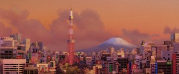 Movie still from “Cars 2” (2011), directed by John Lasseter – A painting of a city with a mountain in the background; Extreme Wide shot, Low angle