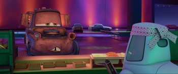 Movie still from “Cars 2” (2011), directed by John Lasseter – Medium shot, Over the shoulder angle