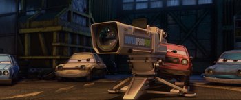 Movie still from “Cars 2” (2011), directed by John Lasseter – Wide shot, Low angle