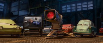 Movie still from “Cars 2” (2011), directed by John Lasseter – Wide shot, High angle