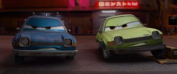 Movie still from “Cars 2” (2011), directed by John Lasseter – Wide shot, Low angle