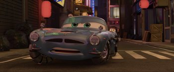 Movie still from “Cars 2” (2011), directed by John Lasseter – Wide shot, Low angle