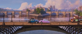 Movie still from “Cars 2” (2011), directed by John Lasseter – A painting of two cars parked on a bridge over a river; Extreme Wide shot, High angle
