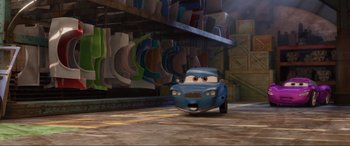 Movie still from “Cars 2” (2011), directed by John Lasseter – Wide shot, Over the shoulder angle