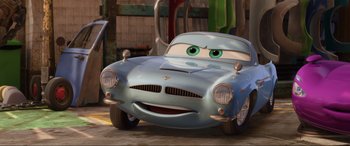 Movie still from “Cars 2” (2011), directed by John Lasseter – Medium shot, Over the shoulder angle