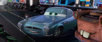 Movie still from “Cars 2” (2011), directed by John Lasseter – Medium shot, Low angle