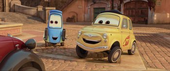 Movie still from “Cars 2” (2011), directed by John Lasseter – Wide shot, Low angle