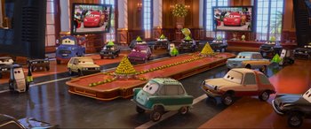 Movie still from “Cars 2” (2011), directed by John Lasseter – Wide shot, High angle