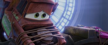 Movie still from “Cars 2” (2011), directed by John Lasseter – A cartoon character with a rope around it's neck; Close Up shot, Low angle