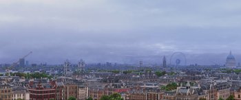 Movie still from “Cars 2” (2011), directed by John Lasseter – A view of a large city from a high point; Extreme Wide shot, High angle